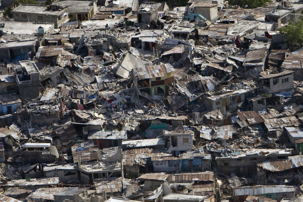 A poor neighbourhood shows the damage after an earthquake measuring 7 plus on the Richter scale rocked Port au Prince Haiti just before 5 pm yesterday, January 12, 2009.